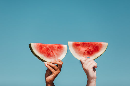 Holding Fresh Watermelons- O2 Living blog makers of organic cold-pressed fruit and vegetable Living Juice