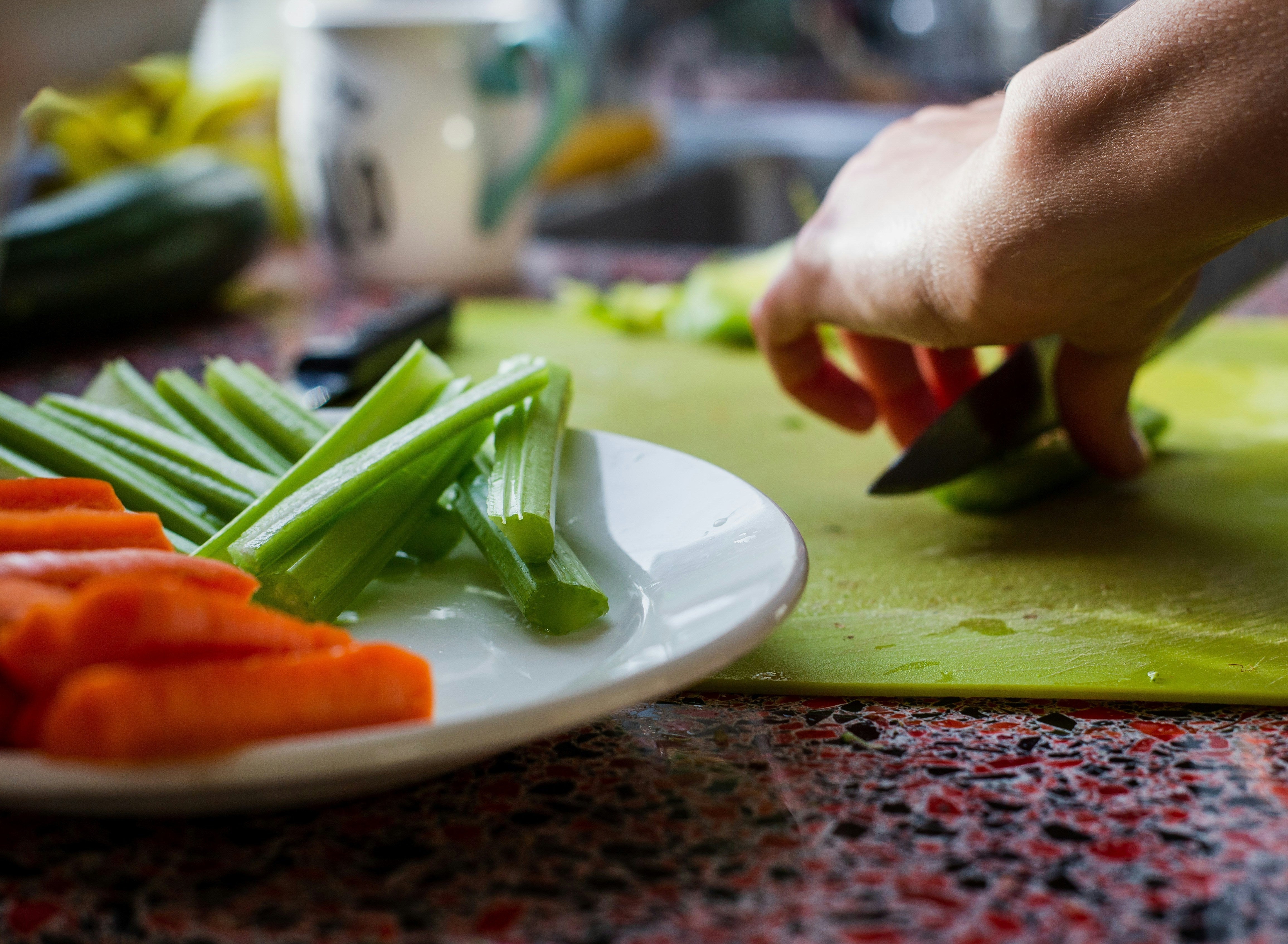 Cutting raw vegetables - blog by O2 Living makers of organic cold-pressed fruit and vegetable juices