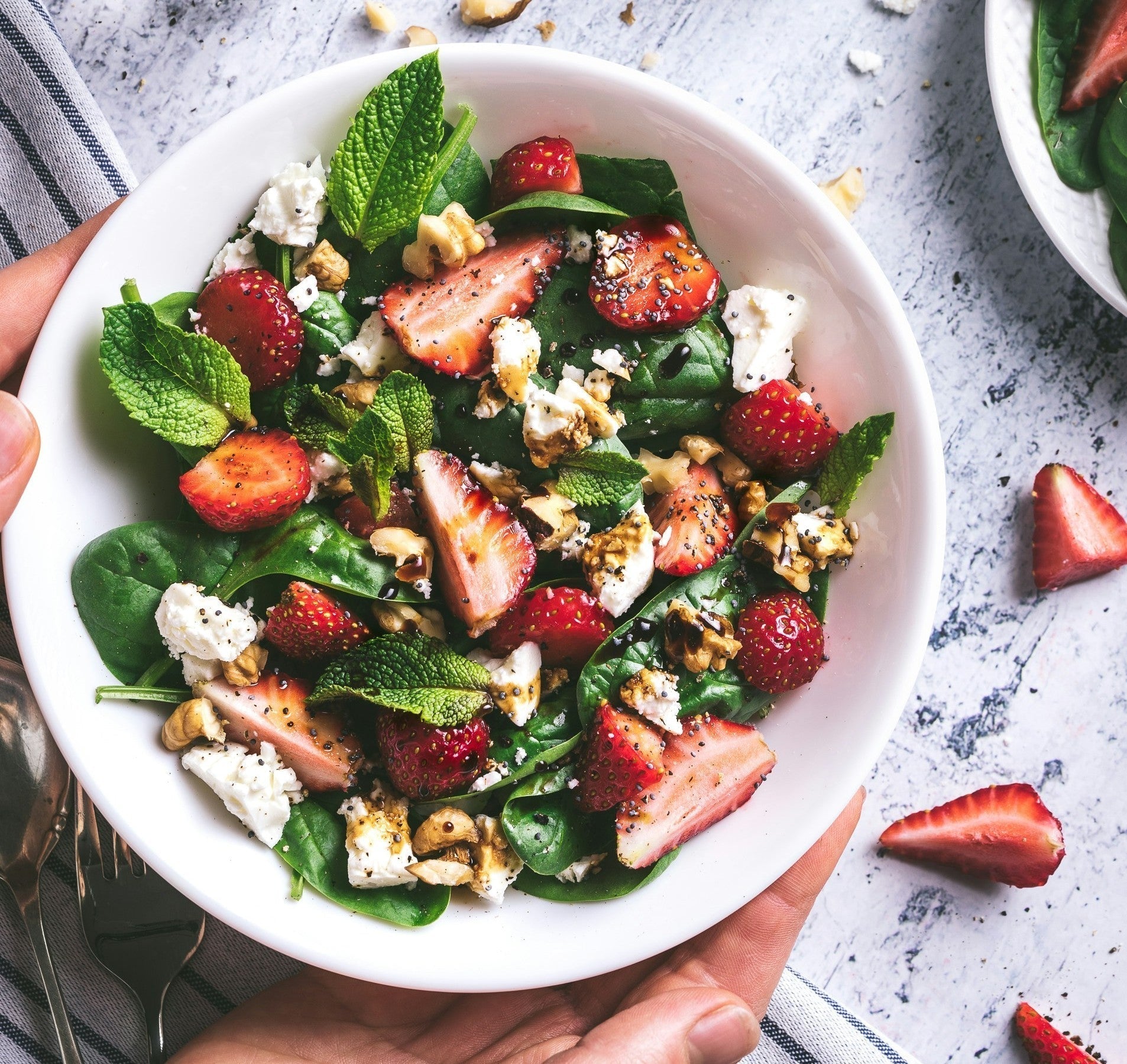 Strawberry spinach salad by makers of organic cold-pressed fruit and vegetable Living Juice