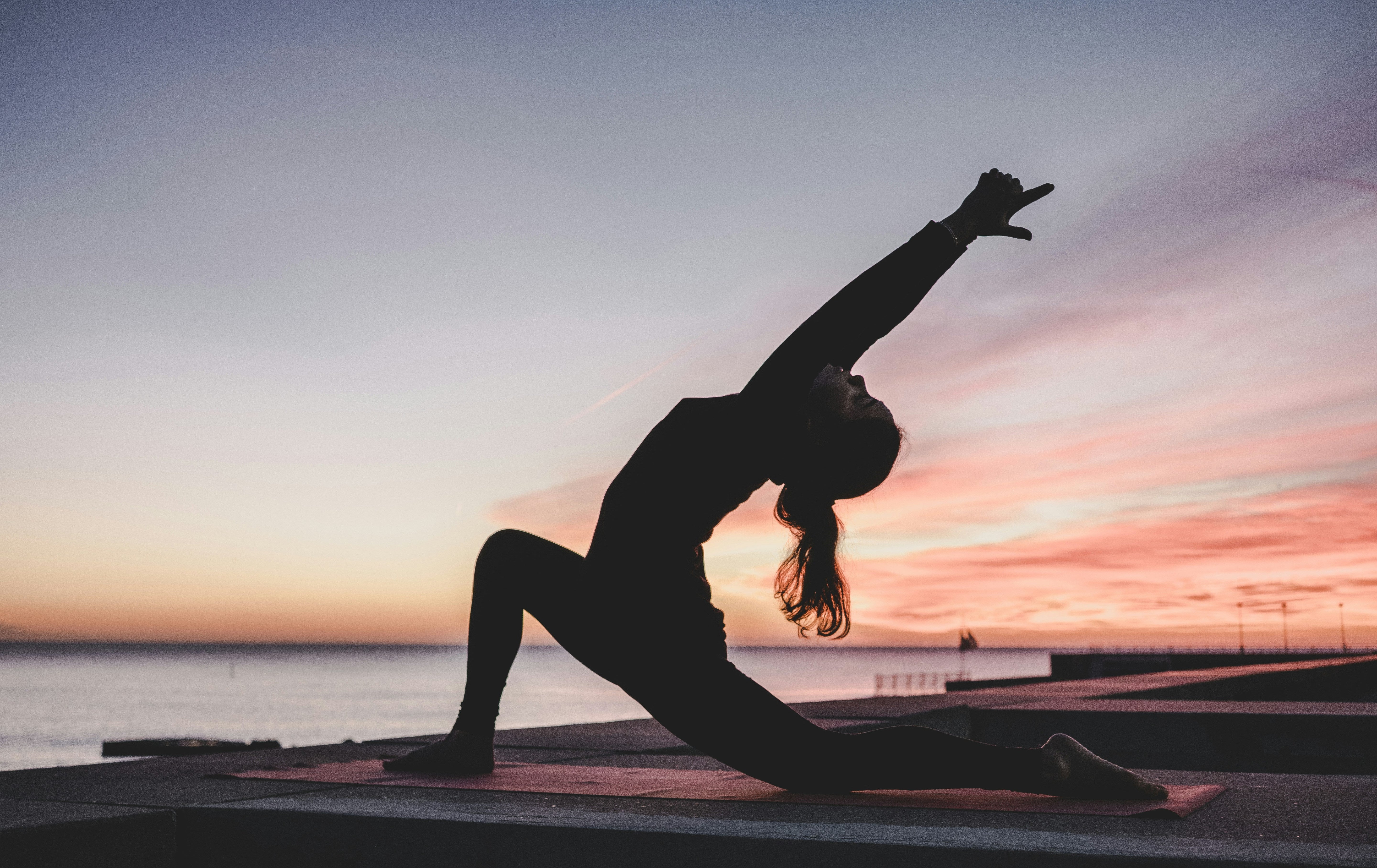 Yoga at sunset - for blog by O2 Living makers of organic cold pressed Living Juice