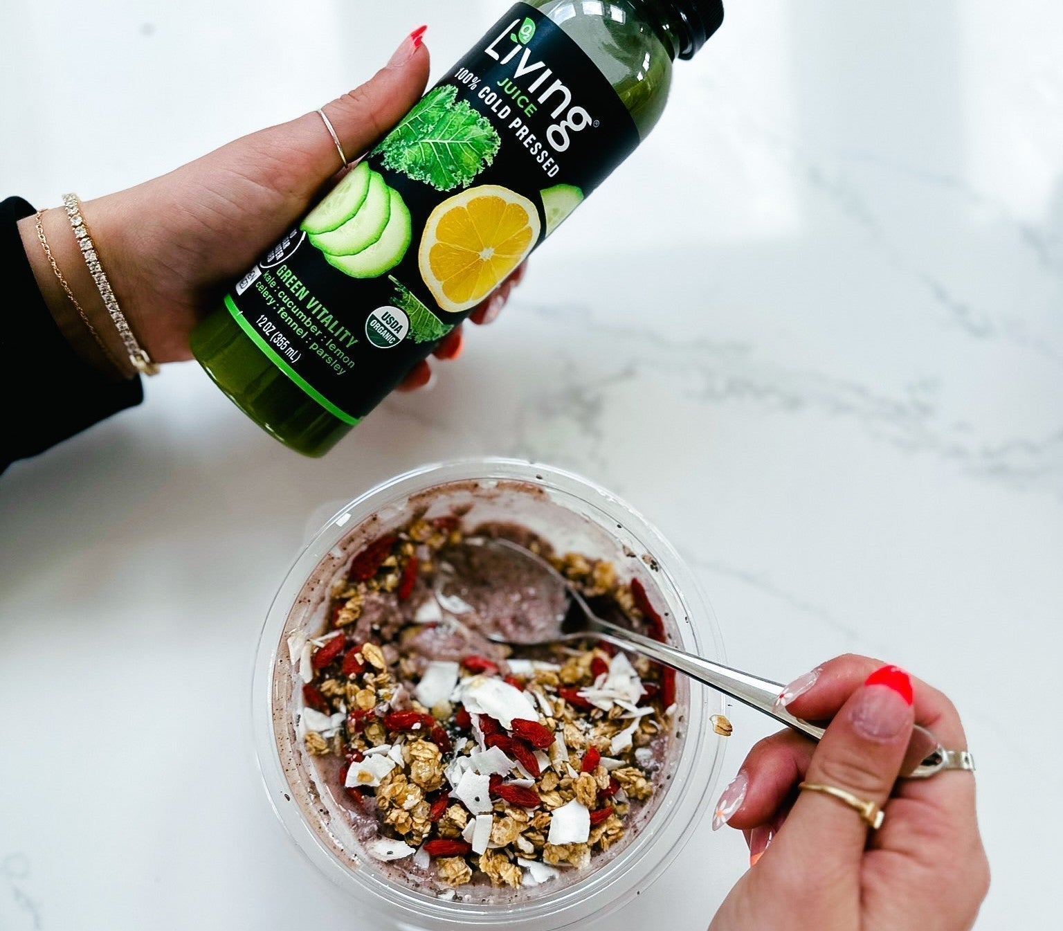 Organic Living Juice Green Vitality with organic fruits and vegetables with a granola bowl 
