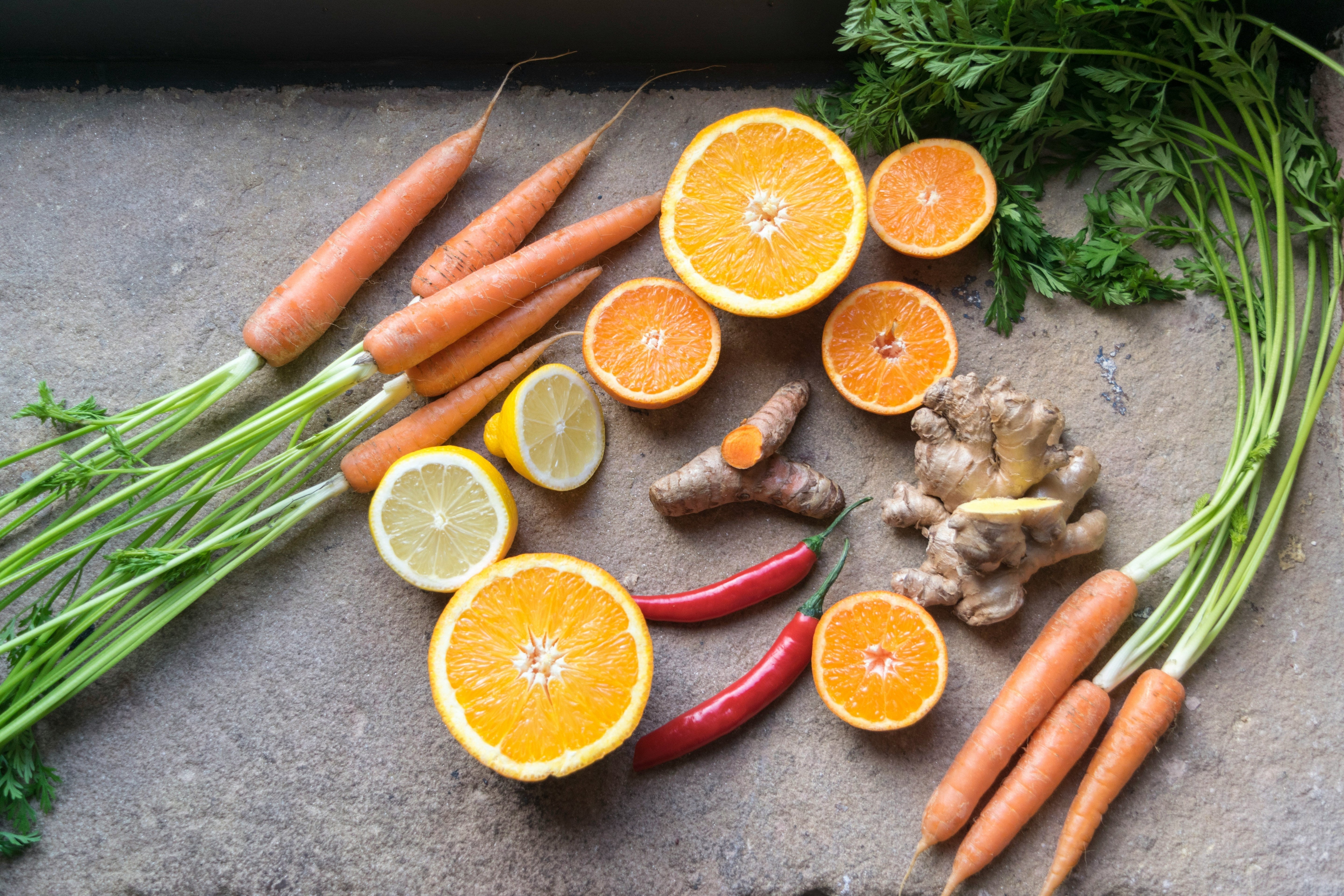 Organic carrots lemon oranges and ginger - blog by O2 Living makers of organic cold pressed Living Juice