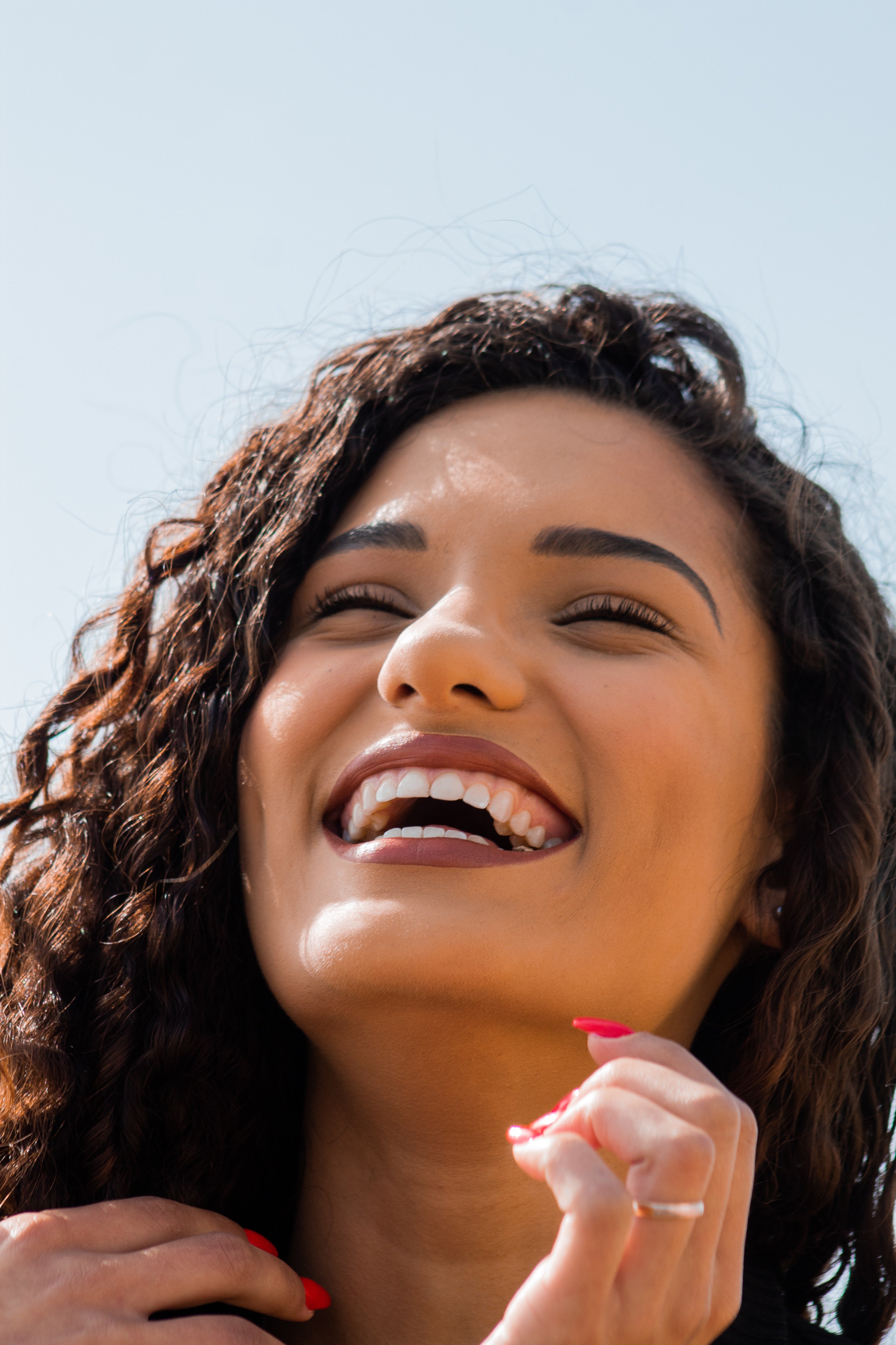 Girl improving mood by smiling